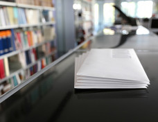 gi-sol-envelopes-on-table-in-office