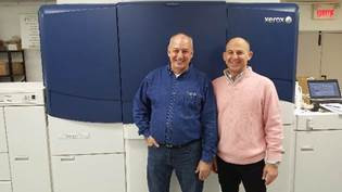 (From left) Denis Beauchamp, general manager, and Warren Werbitt, founder and fisherman, Pazazz Printing.