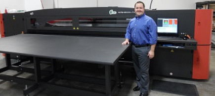 National Print Wholesale President David Peet with his company&rsquo;s new VUTEk GS3250LX Pro printer.