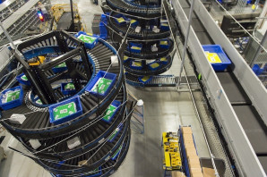 Spiral induction chute carrying customers' products up to the conveyor to be sent to shipping.