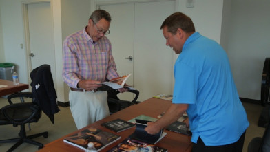 Gold Ink Judges: Judges John Sweeney (left) and John McGurk view entries from a category.