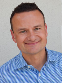 Brian Adam, President of Olympus Group