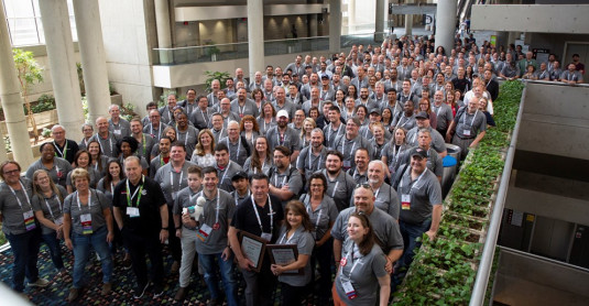 Attendees of Camp Signarama join for a group photo.