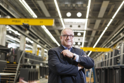 Deutschland. Wiesloch. Gerold Linzbach, Vorsitzender des Vorstandes Heidelberger Druckmaschinen AG steht in einer Produktionshalle des Print Media Center. 30.2014. [Photo: &Acirc;&copy; (c) Bernd Roselieb. email: info@bernd-roselieb.de]