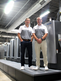 According to Jonathan Wallace (right) &mdash; shown standing with Wallace Graphics co-owner Jake Wallace &mdash; &ldquo;Print is alive and well. People are finding ways to use it differently.&rdquo; | Credit: Wallace Graphics