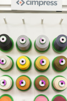 Threads at an embroidery station at the Windsor plant. Using a wide range of colored threads allows customers to upload an image to be rendered into an accurate and detailed embroidery.