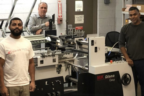 From left, Ron Persaud, folder gluer operator, Jim D'Alessandro, VP manufacturing, and Anil Balram, folder gluer operator.