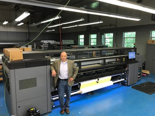 Excelsus Solutions CEO and President of D&eacute;cor Brilliance, Mark Laniak, pictured with the HP Latex 3500. 