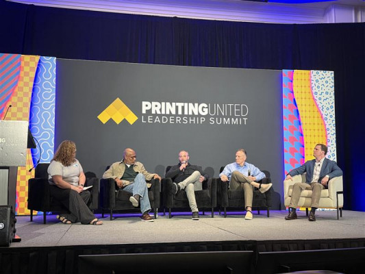 On the final day of the event, Denise Gustavson, editorial director of media brands at PRINTING United Alliance led a panel discussing the peer focus group breakout key takeaways with (from left) Ira Jackson, president of Perfect Image; Jed Siefert, co-founder of Stakes Manufacturing; Eric Blohm, president and CEO of Freedom Graphic Systems; and John Sommers, president of Allied Printing Services.